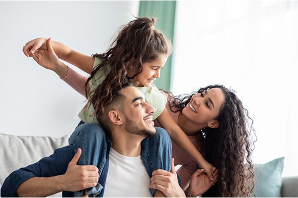 https://tower.10bestlifeinsurances.com/wp-content/uploads/2023/05/Cheerful-Middle-Eastern-Family-Of-Three-Having-Fun-Together-At-Home.jpg